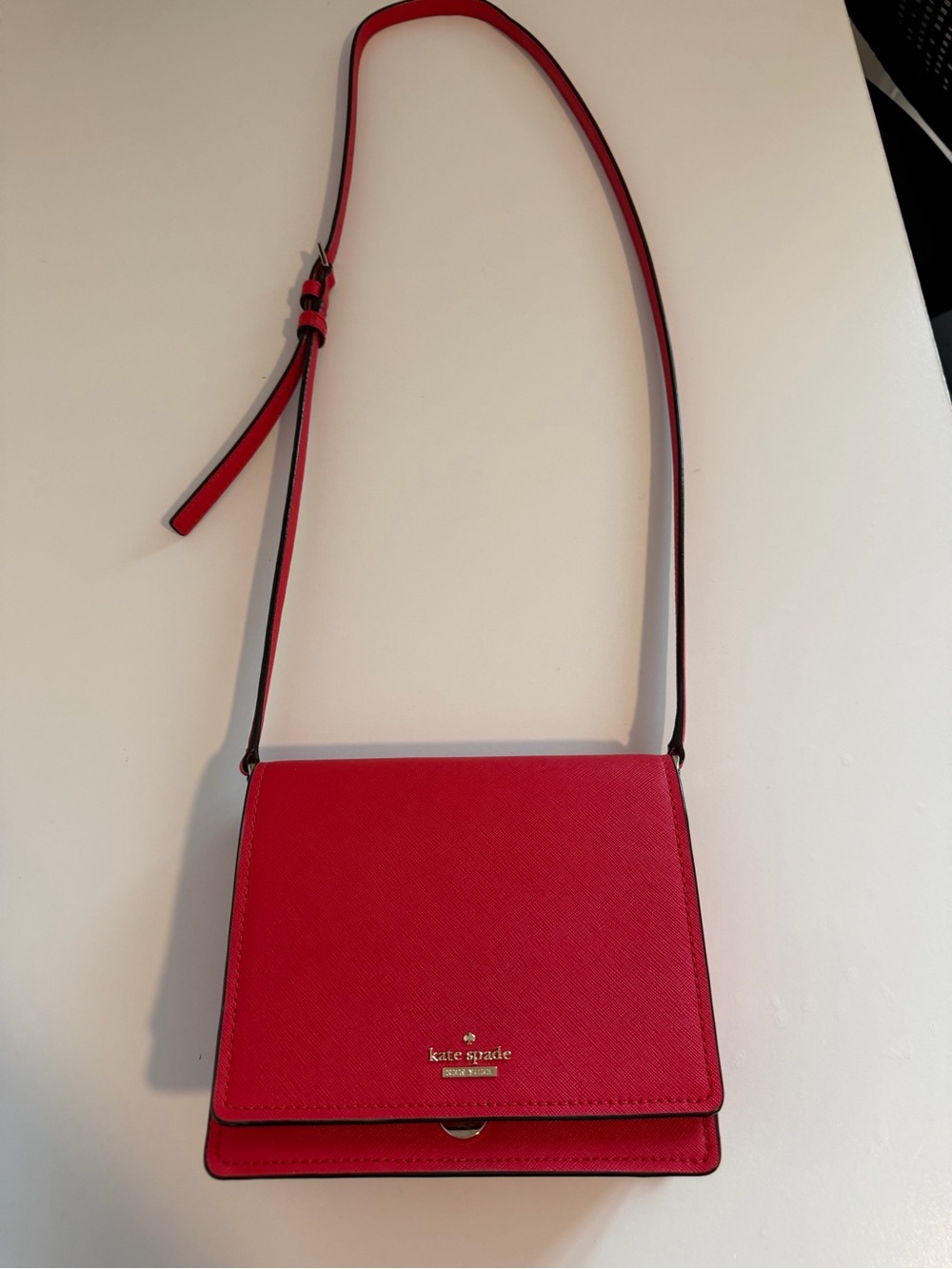 kate spade red crossbody bag with gold logo
